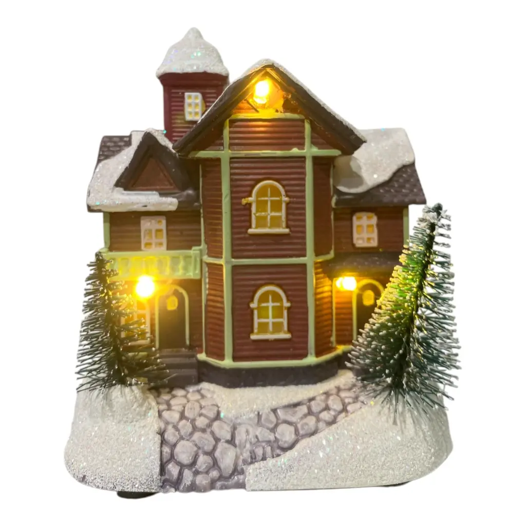CASA NAVIDEÑA PVC CON LUZ LED A PILAS 10X8X12CM