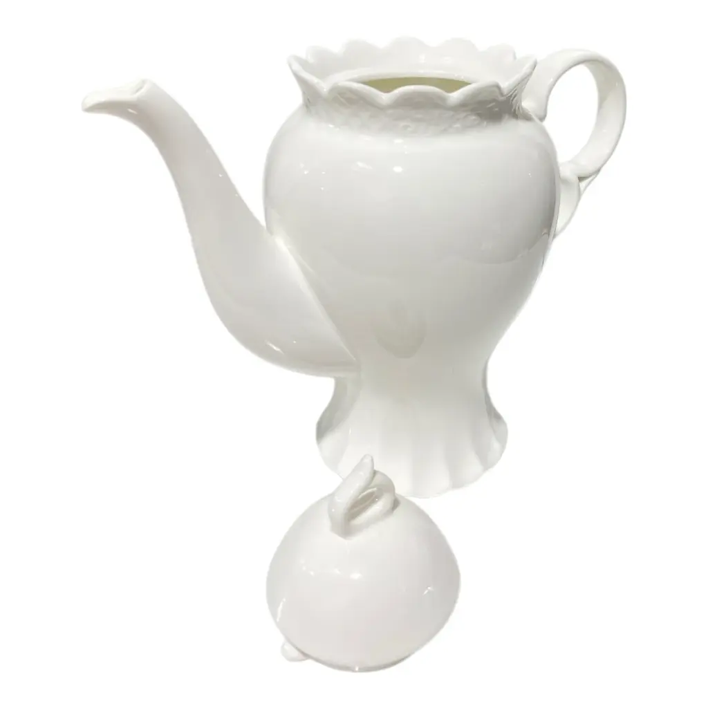 TETERA DE PORCELANA BLANCA 1.2LT 26X12X24CM