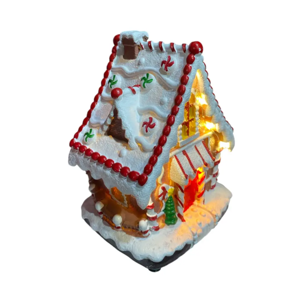 Casa Navideña Candy poliresina, con luz led y musica. USB. Ref:ES29009 (11.5x10x15.5cm)