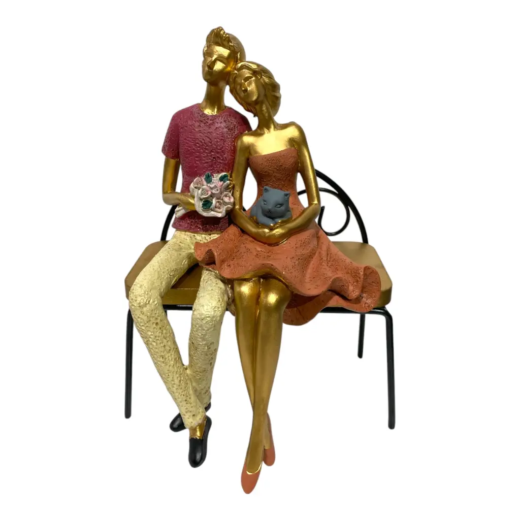PAREJA EN SILLON METAL/MADERA DE POLIRESINA 14X14X21CM 3COLORES C/U.
