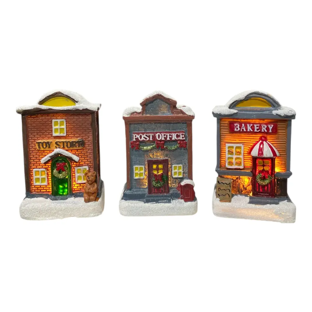 CASA NAVIDEÑA POLIRESINA CON LUZ LED A PILAS 5X5.5X9CM 3MOD. C/U